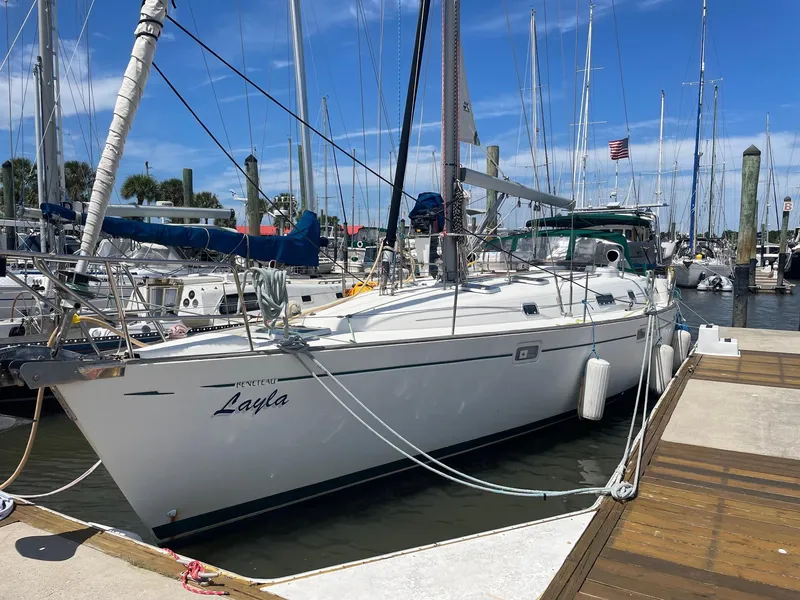 Slide: The Image of Beneteau Oceanis 461 sailboat docked at marina, 1997 model, named "Layla". - 2