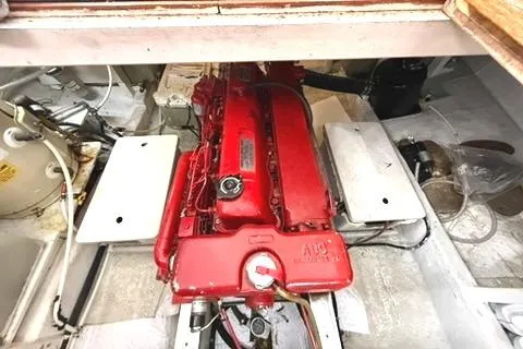 Slide: The Image of Engine compartment of 1981 Grand Banks 36 Classic with red engine. - 31