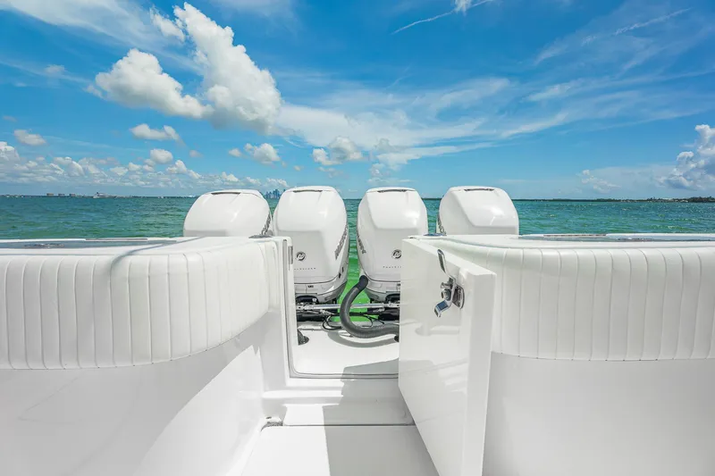 Slide: The Image of 2017 SeaHunter 39 Tournament boat with four engines, ocean view, and clear blue sky. - 22