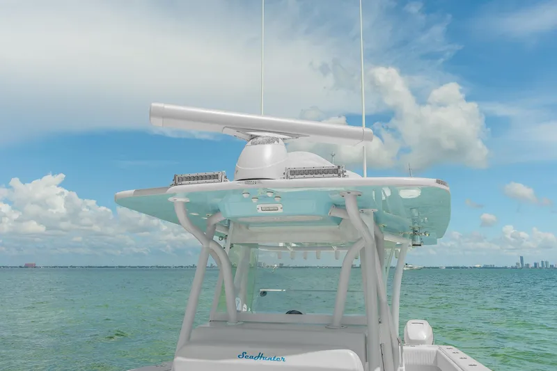 Slide: The Image of 2017 SeaHunter 39 Tournament boat on open water under blue sky. - 23