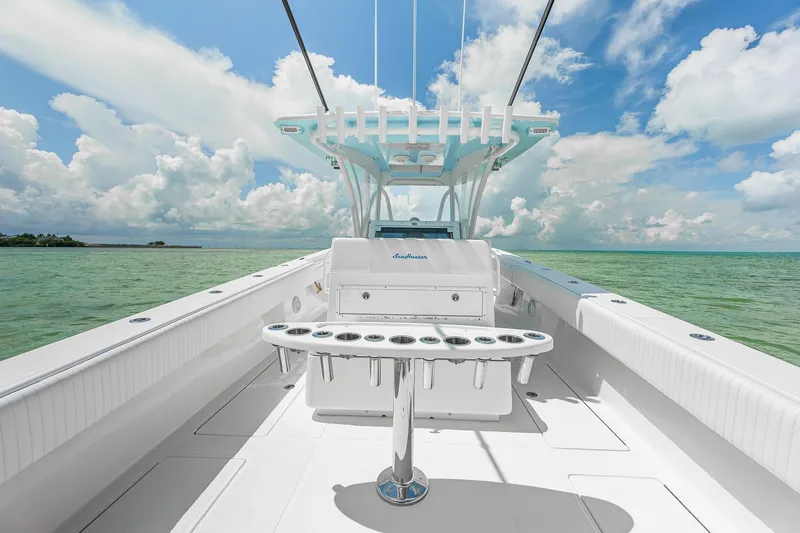 Slide: The Image of 2017 SeaHunter 39 Tournament boat on calm sea under blue sky with clouds. - 24