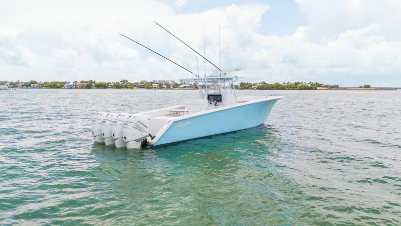 Slide: The Image of 2017 SeaHunter 39 Tournament boat with four engines on open water. - 8
