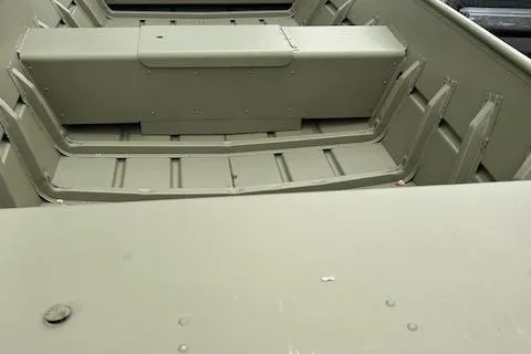 Slide: The Image of 2024 Lund 1648M boat interior with bench seating and storage compartments. - 8