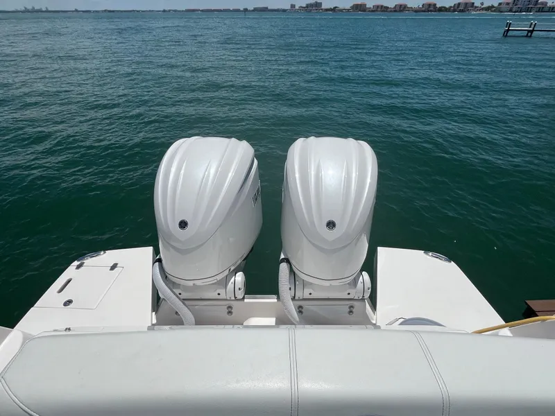 Slide: The Image of 2024 Regal 33 SAV boat controls with joystick and throttle levers. - 10