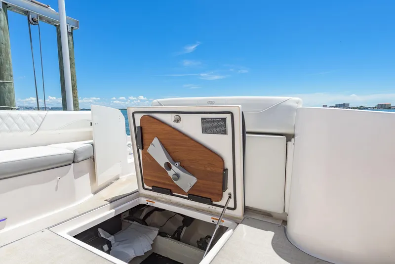 Slide: The Image of 2024 Regal 33 SAV interior with sink, countertop, and window with curtains. - 18