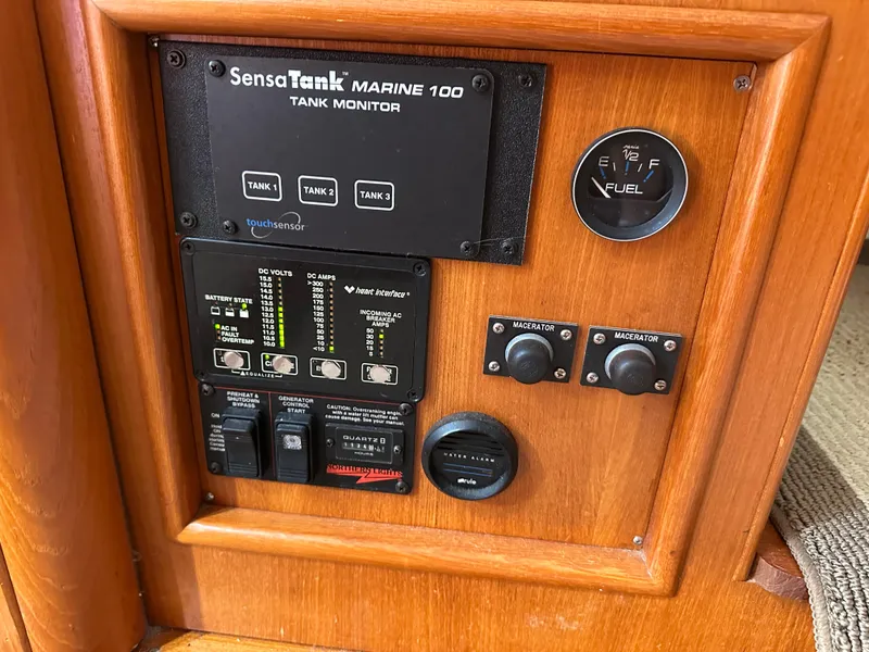 Slide: The Image of Control panel of a 2002 Hunter 410 boat with SensaTank Marine 100 monitor. - 27