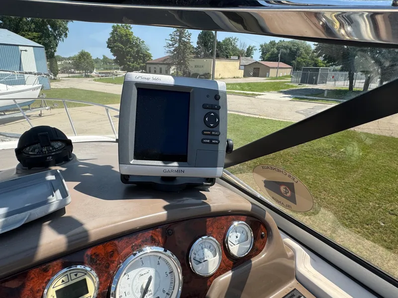 Slide: The Image of Dashboard of a 2006 Regal 2565 Window Express boat with Garmin GPS and compass. - 15