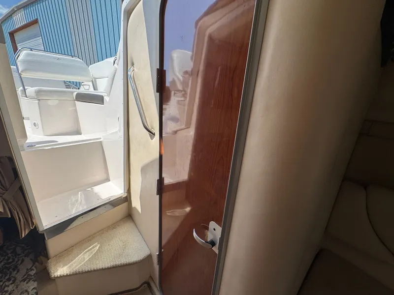Slide: The Image of Interior view of 2006 Regal 2565 Window Express boat cabin and entrance. - 26