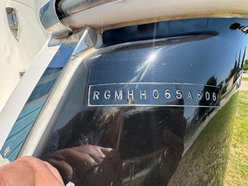Slide: The Image of 2006 Regal 2565 Window Express boat hull identification number (HIN) close-up. - 28