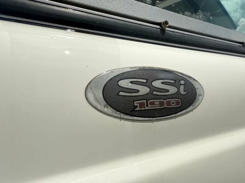 Slide: The Image of 2007 Chaparral 190 SSi boat emblem on white surface. - 10