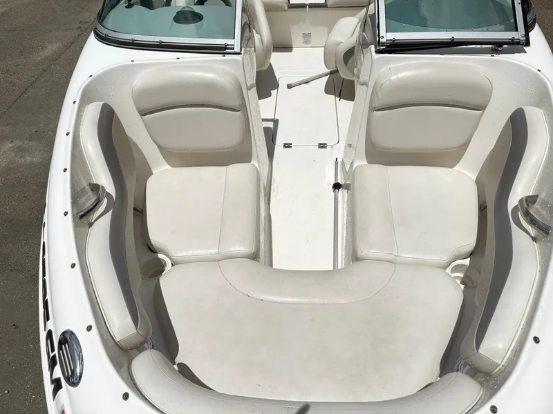 Slide: The Image of 2007 Chaparral 190 SSi boat interior with white seating and open cockpit design. - 17