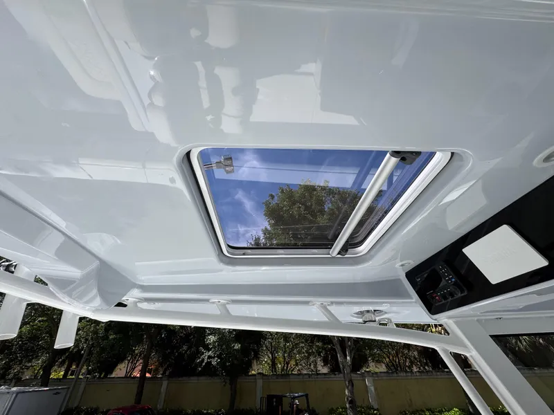Slide: The Image of 2025 Jupiter 380LS boat interior with skylight, showcasing sleek design and modern features. - 17