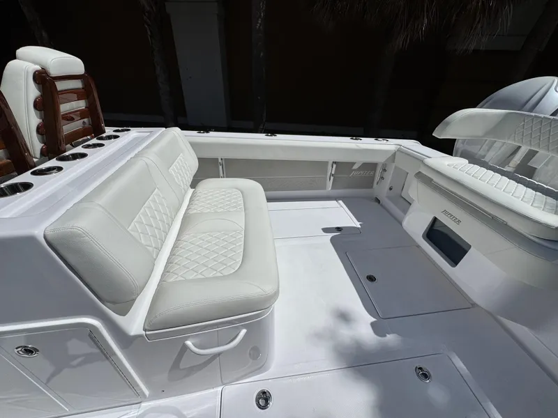Slide: The Image of Luxurious interior of 2025 Jupiter 380LS boat with white leather seating. - 21
