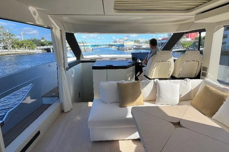 Slide: The Image of Luxurious interior of 2025 Azimut SeaDeck6 yacht with scenic waterfront view. - 11