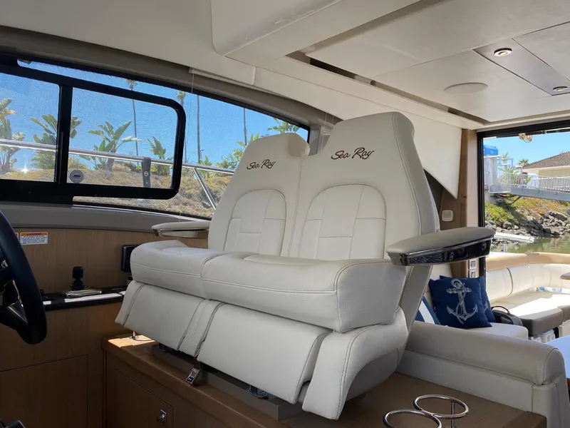 Slide: The Image of Luxurious interior of 2018 Sea Ray 400 Fly yacht with plush seating. - 18
