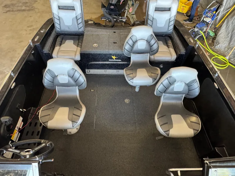 Slide: The Image of 2020 Nitro ZV19 Sport boat seat with gray and black upholstery. - 11