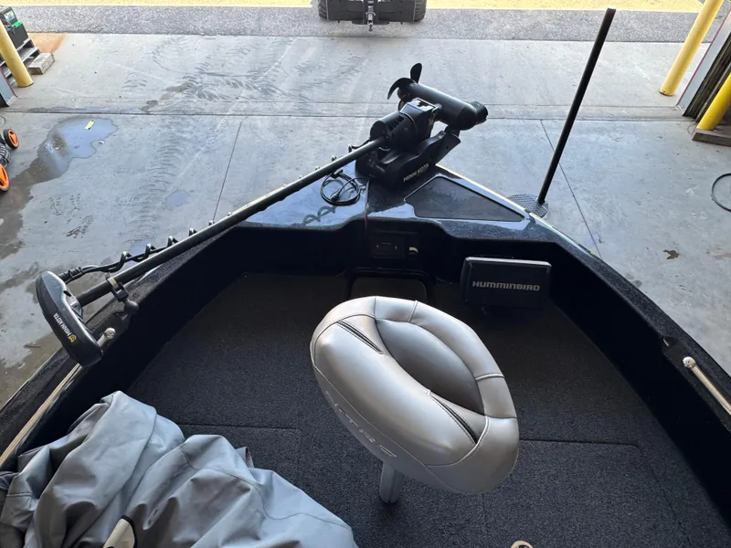 Slide: The Image of 2020 Nitro ZV19 Sport boat interior with storage compartment and metal handle. - 12