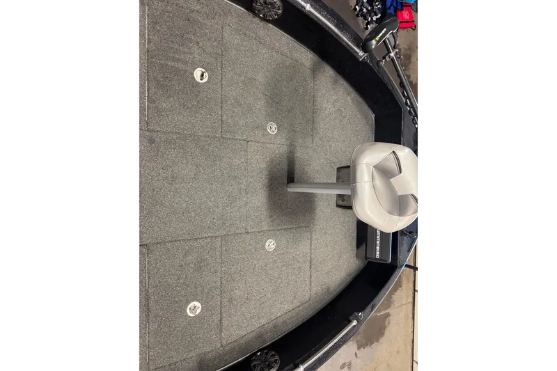 Slide: The Image of 2020 Nitro ZV19 Sport boat interior with gray carpet and swivel seat. - 15