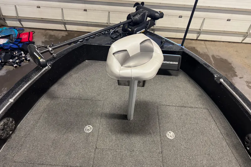 Slide: The Image of 2020 Nitro ZV19 Sport boat interior with fishing seat and trolling motor. - 16