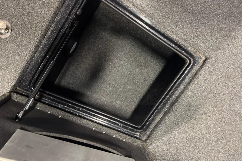 Slide: The Image of Open storage compartment in 2020 Nitro ZV19 Sport boat interior. - 23