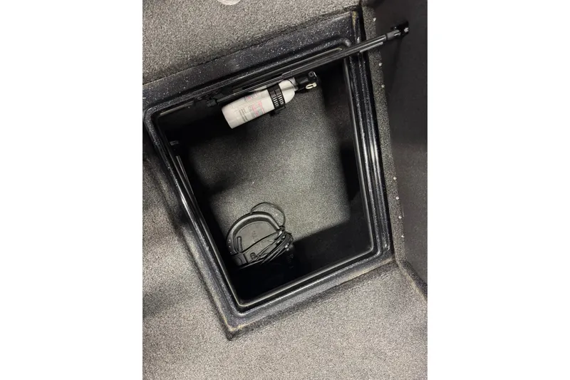 Slide: The Image of Storage compartment of 2020 Nitro ZV19 Sport boat with fire extinguisher. - 24
