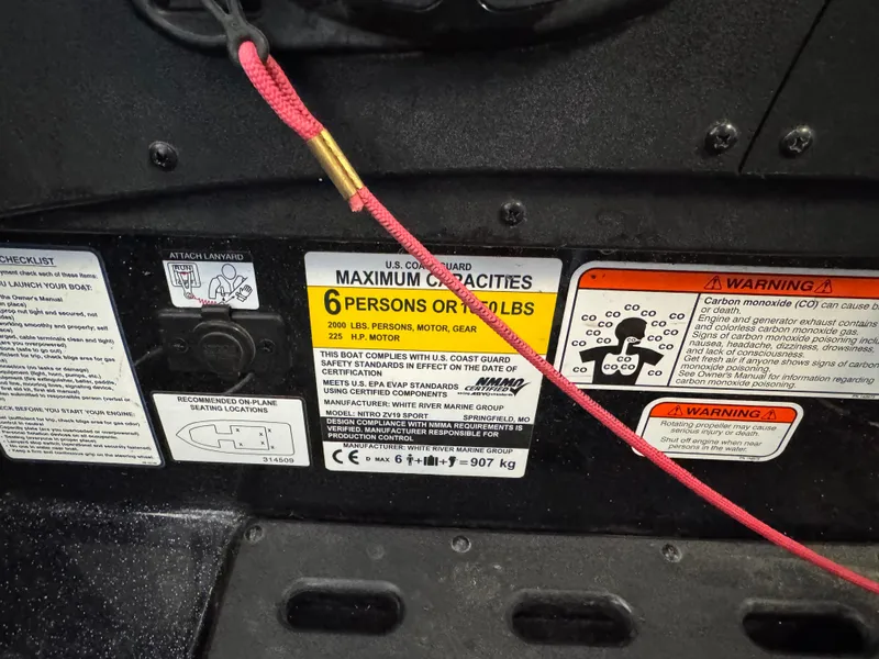 Slide: The Image of 2020 Nitro ZV19 Sport boat dashboard with steering wheel and gauges. - 7