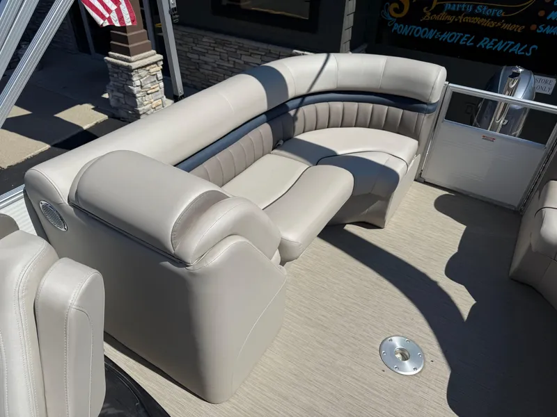 Slide: The Image of 2017 Bennington G22 pontoon boat with beige seating and modern design. - 14