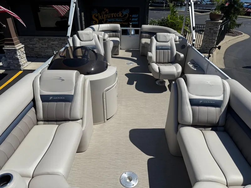 Slide: The Image of 2017 Bennington G22 pontoon boat interior with plush seating and modern design. - 6