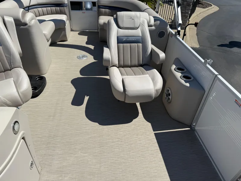 Slide: The Image of 2017 Bennington G22 boat interior with plush seating and cup holders. - 8