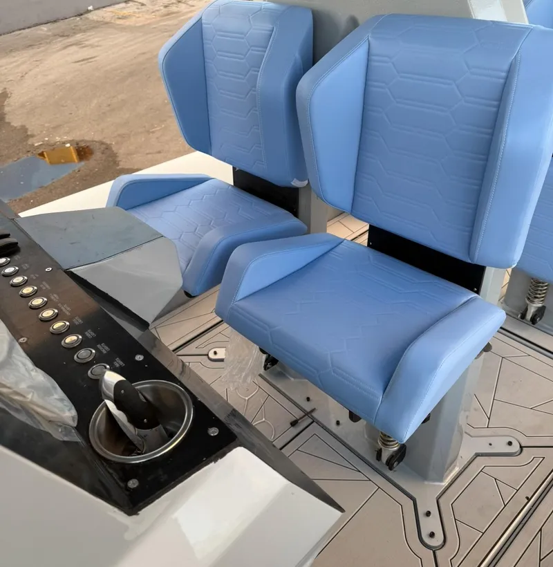 Slide: The Image of Blue seats and control panel of Novielli Veloche 349, 2026 model. - 3