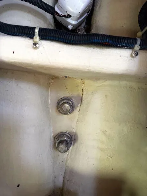Slide: The Image of Close-up of Catalina 315 (2017) boat interior showing bolts and wiring. - 15