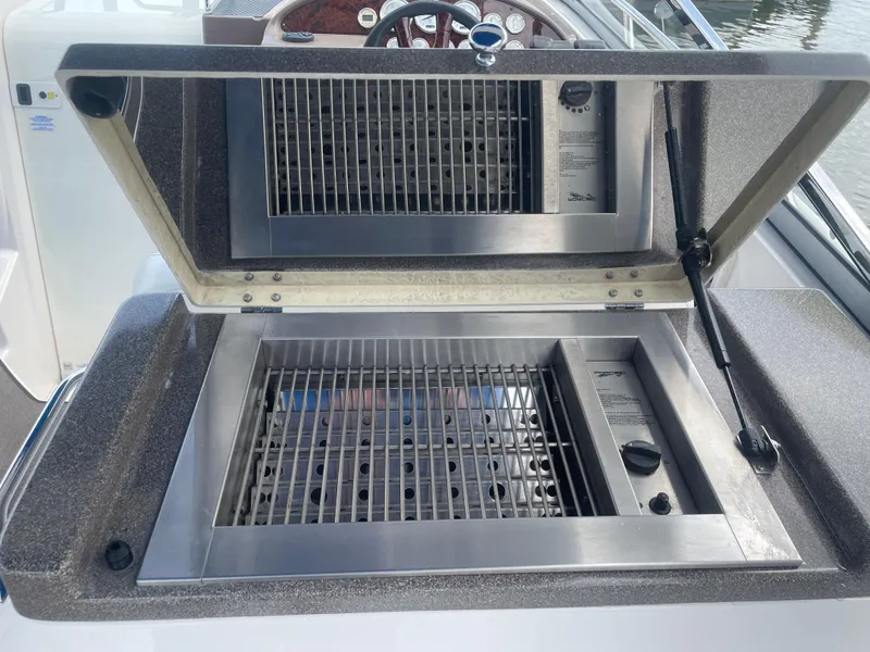 Slide: The Image of Built-in grill on a 2005 Regal 3350 Sport Cruiser boat. - 3