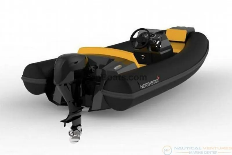 Slide: The Image of 2022 Northstar Axs 3.1 inflatable boat with outboard motor, black and yellow design. - 9