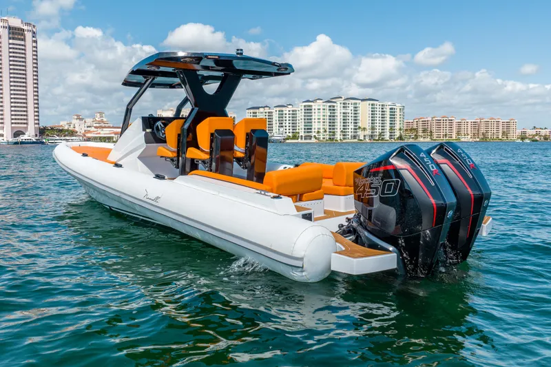 Slide: The Image of 2026 Novielli Veloche 349 boat with twin engines on water, cityscape background. - 5