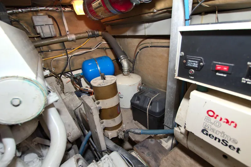Slide: The Image of Engine room of 1990 Post 44 Sport Fisherman with generator and equipment. - 66