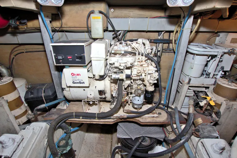 Slide: The Image of Engine room of 1990 Post 44 Sport Fisherman with Onan Marine GenSet. - 69