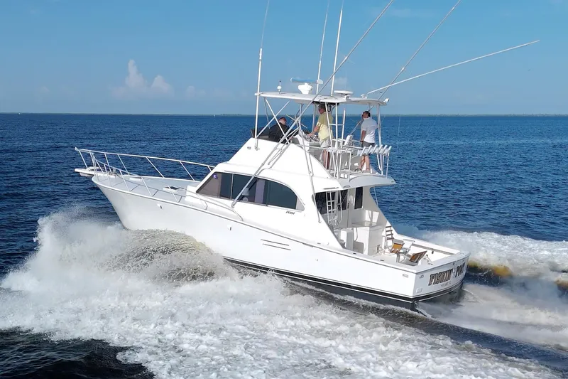 Slide: The Image of 1990 Post 44 Sport Fisherman yacht cruising on open water. - 3