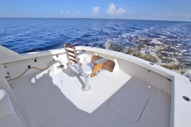 Slide: The Image of 1990 Post 44 Sport Fisherman boat deck with ocean view. - 31