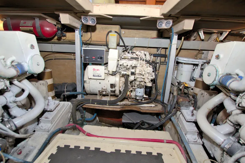 Slide: The Image of Engine room of a 1990 Post 44 Sport Fisherman boat with Onan GenSet generator. - 65
