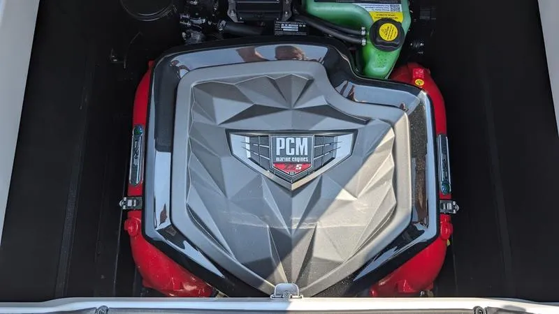 Slide: The Image of 2025 Nautique Super Air Nautique GS22 engine with PCM cover, showcasing modern design. - 15