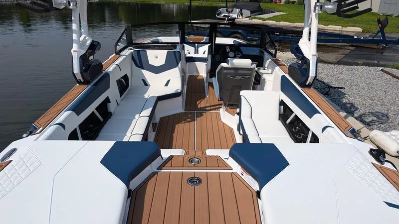 Slide: The Image of 2025 Nautique Super Air Nautique GS22 interior with sleek seating and modern design. - 8
