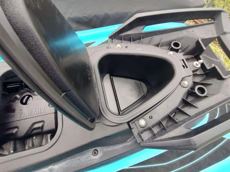 Slide: The Image of 2022 Yamaha WaveRunner GP1800R storage compartment open, showcasing interior design. - 3