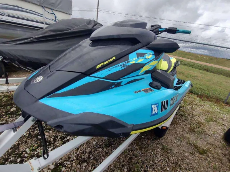 Slide: The Image of 2022 Yamaha WaveRunner GP1800R in vibrant blue on a trailer, ready for adventure. - 7
