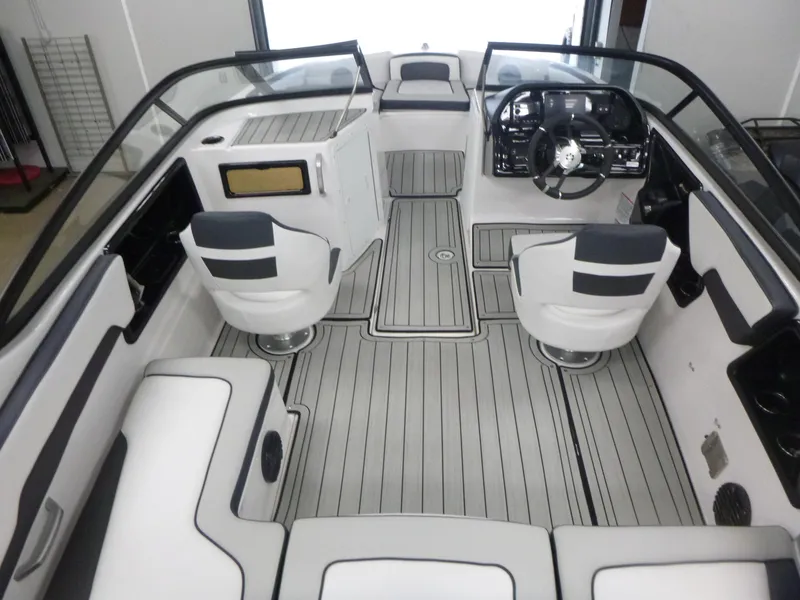 Slide: The Image of 2025 Yamaha Boats 195S interior with sleek seating and modern dashboard design. - 5