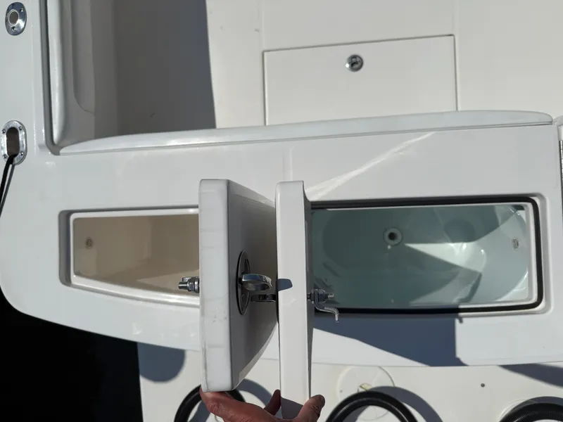 Slide: The Image of 2017 Regulator 34SS boat storage compartments and livewell detail. - 19