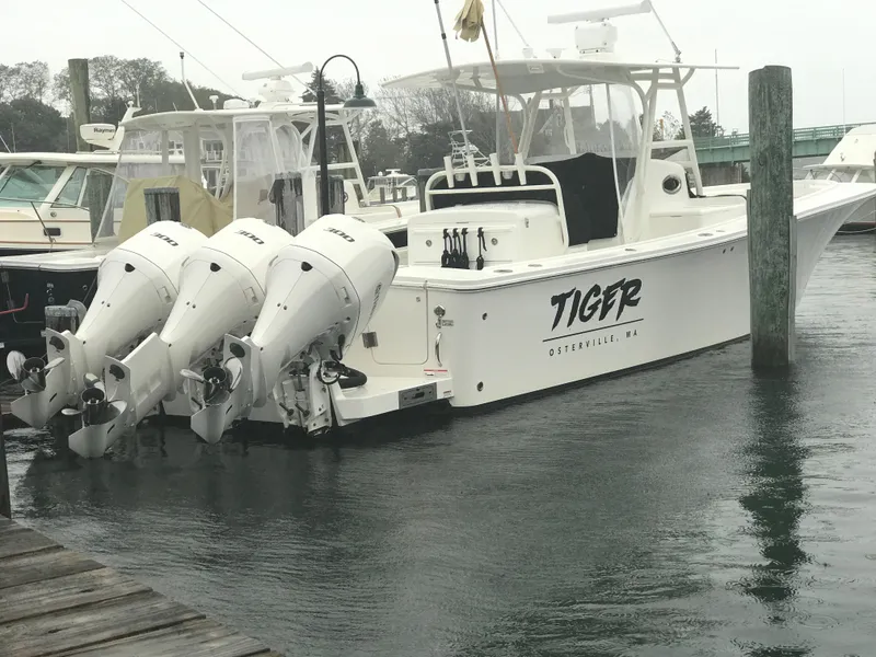 Slide: The Image of 2017 Regulator 34SS boat with triple engines docked in Osterville, MA. - 3