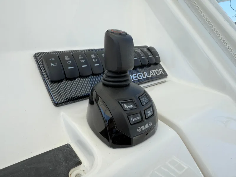 Slide: The Image of Joystick control panel on 2017 Regulator 34SS boat with Yamaha branding. - 35