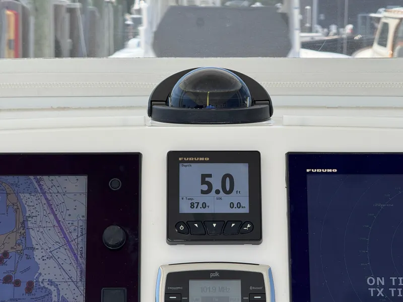 Slide: The Image of Dashboard of a 2017 Regulator 34SS boat with Furuno navigation displays. - 8