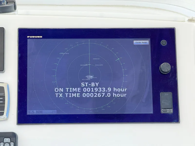 Slide: The Image of Furuno radar display on 2017 Regulator 34SS boat, showing operational hours and standby status. - 9