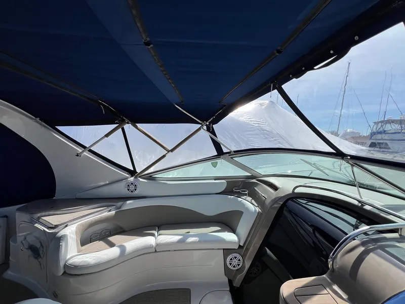 Slide: The Image of Interior view of 2004 Wellcraft 3700 Martinique boat with seating and canopy. - 10